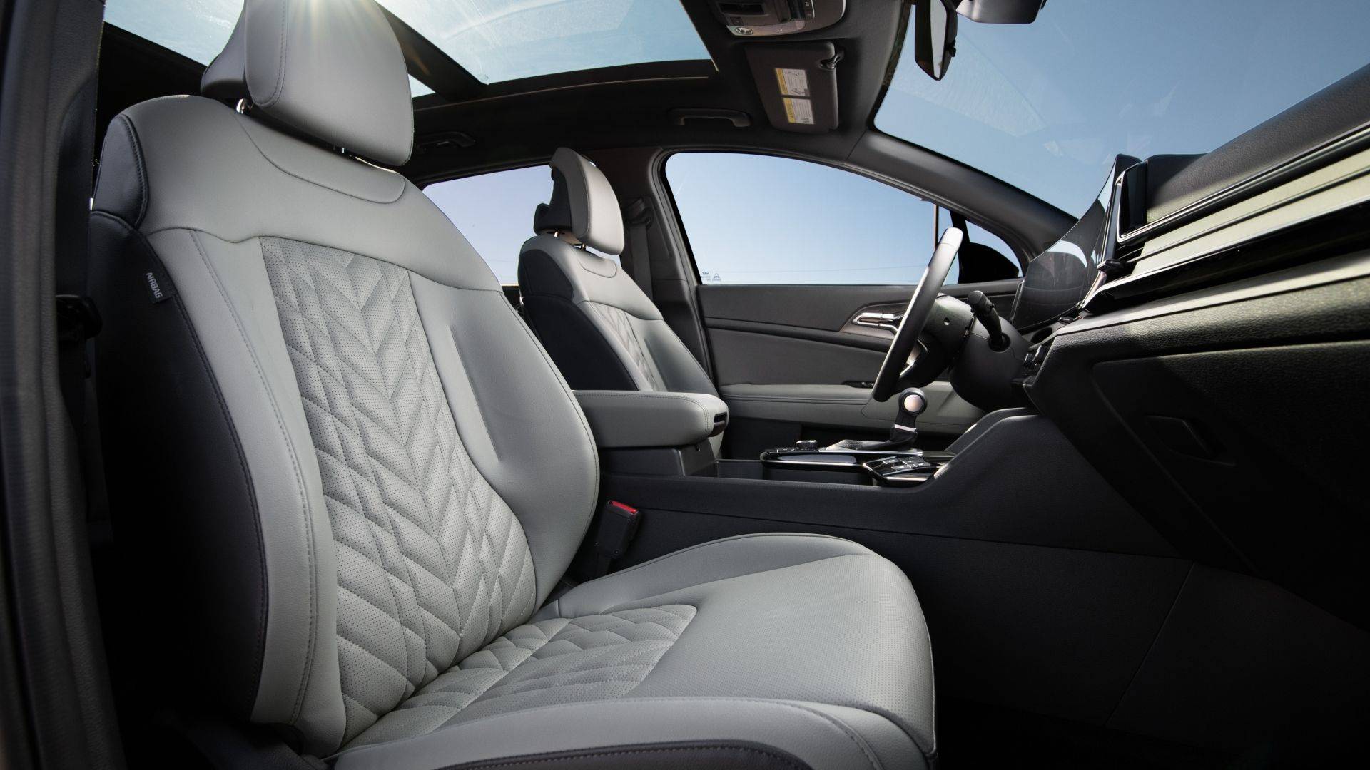 Front seats and center console of the 2023 Kia Sportage X-Pro
