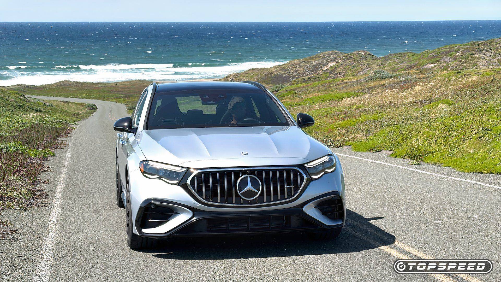 2026 Mercedes-AMG E 53 Hybrid Wagon driving on a mountain road