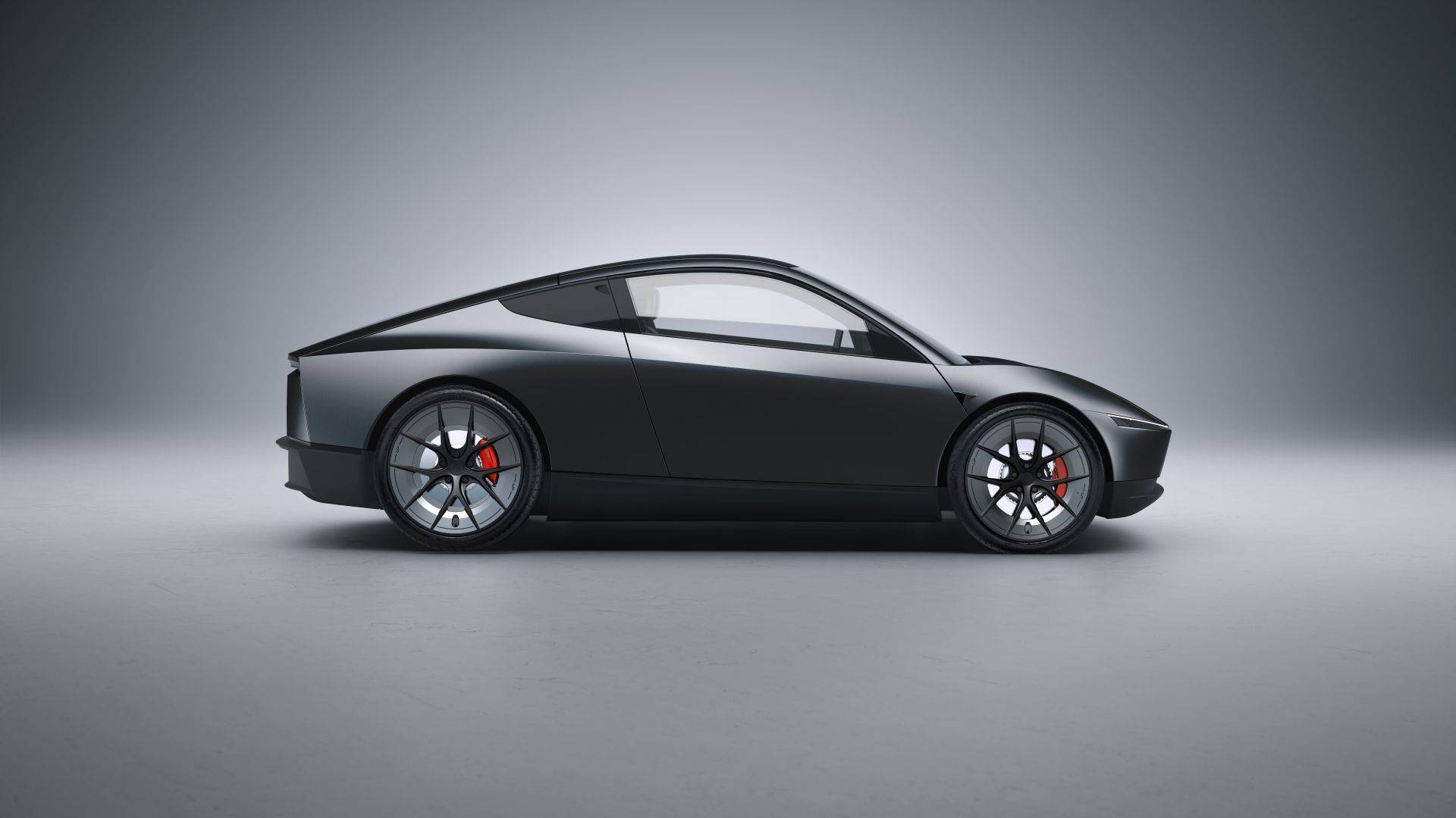Side profile of a Tesla Cybercab with aerodynamic wheels