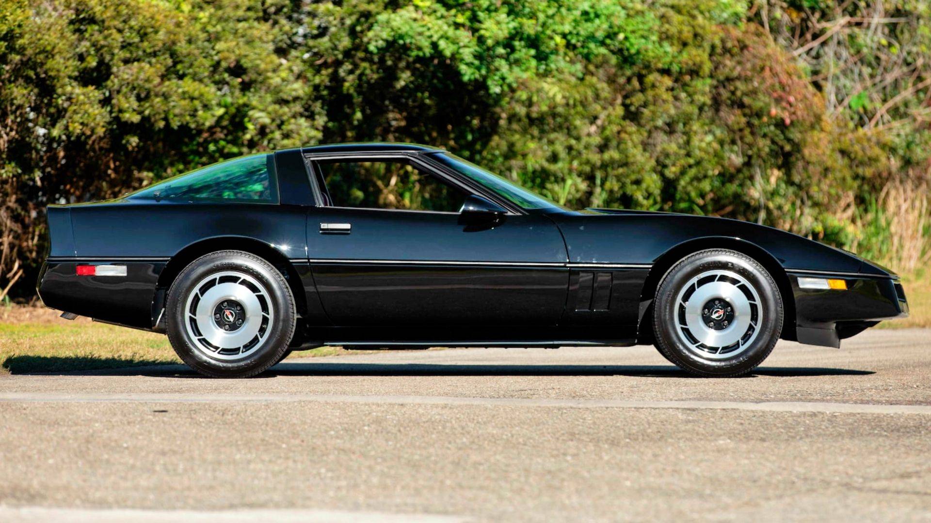 Front three-quarter view of a black Chevrolet Corvette C4