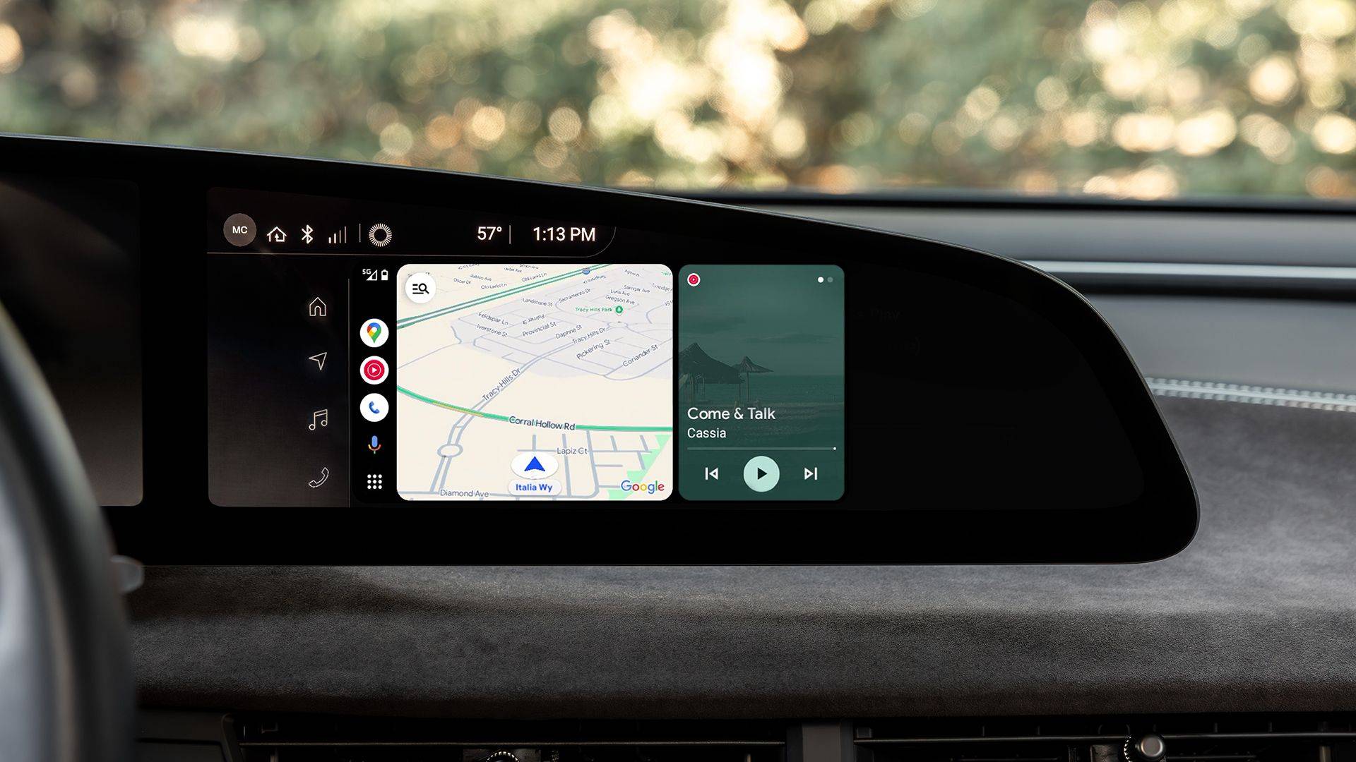 Lucid Air dashboard display showing Android Auto with Google Maps navigation and music playback controls.