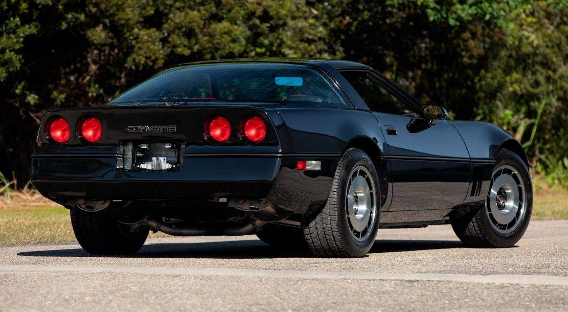Rear three-quarter view of a black Chevrolet Corvette C4