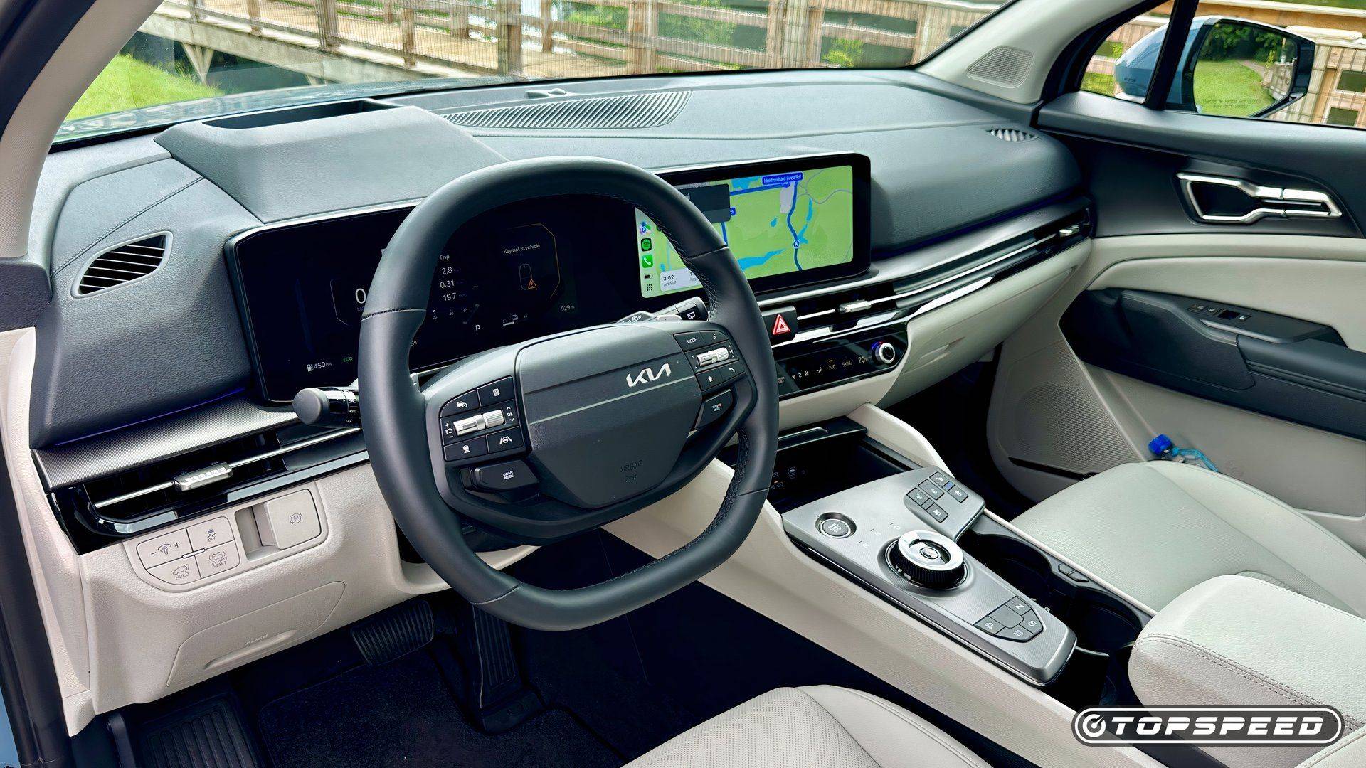 Dashboard and infotainment display inside the 2026 Kia Sportage Hybrid