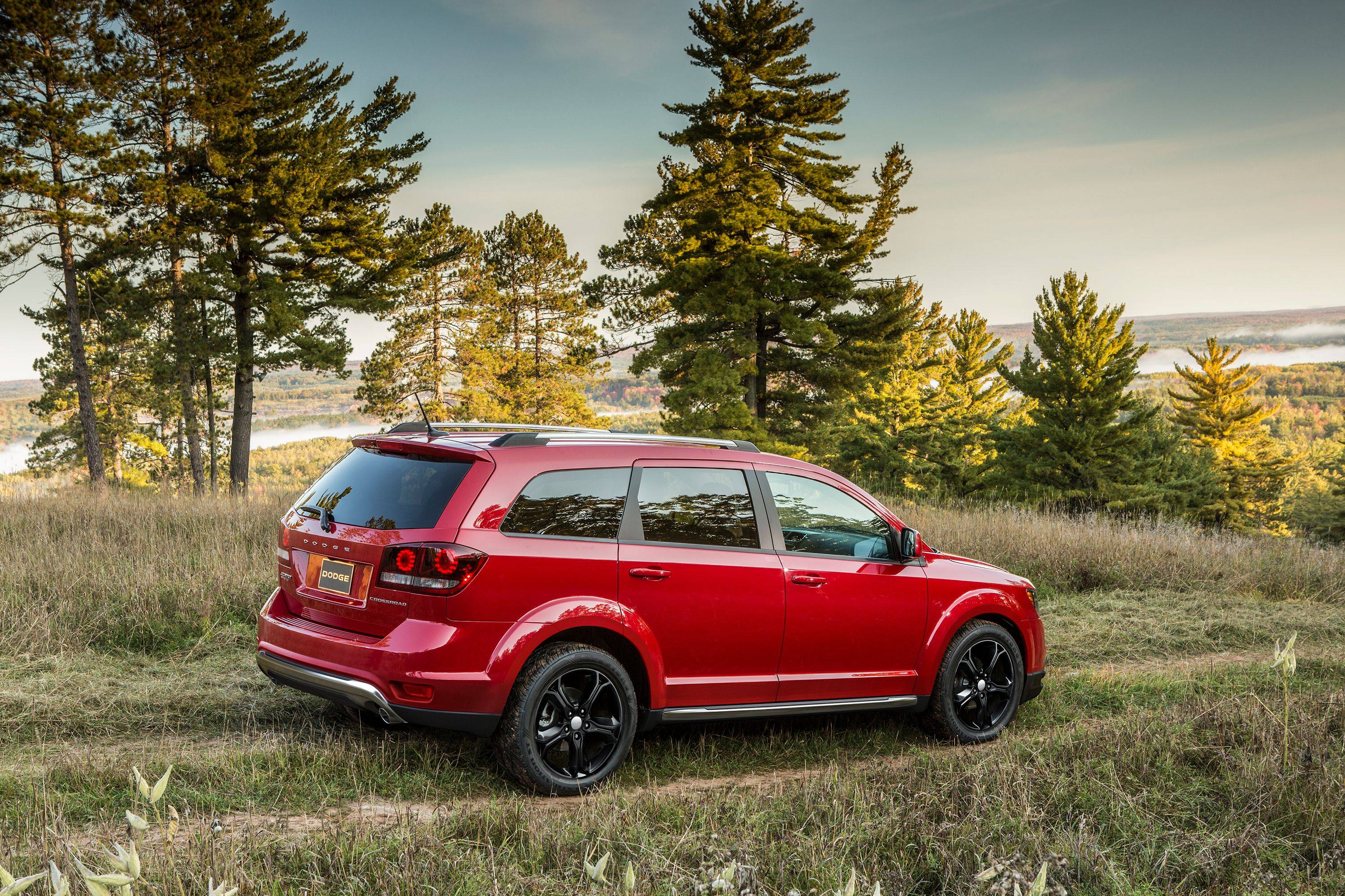 Rear three-quarter view of a red 2018 Dodge Journey SUV