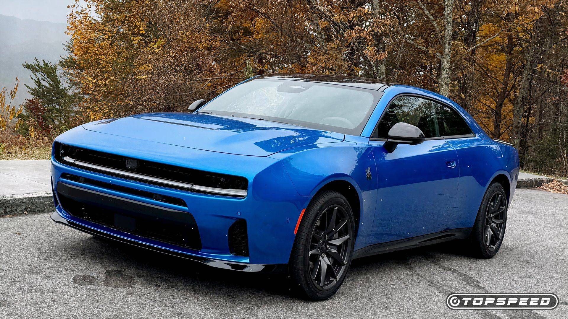 Blue 2026 Dodge Charger Sixpack parked on a mountain road