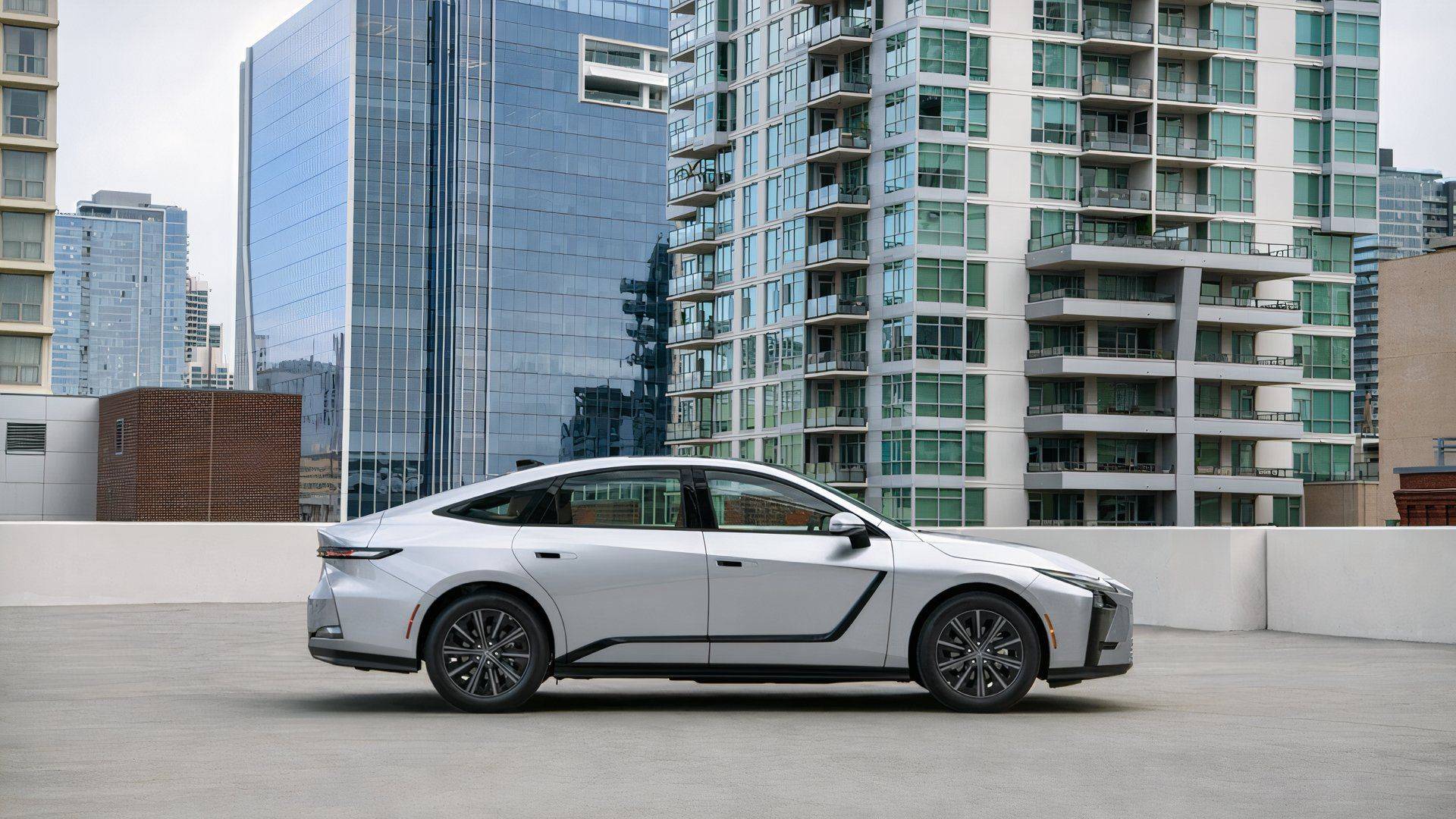 2026 Lexus ES 350h shown in profile while parked