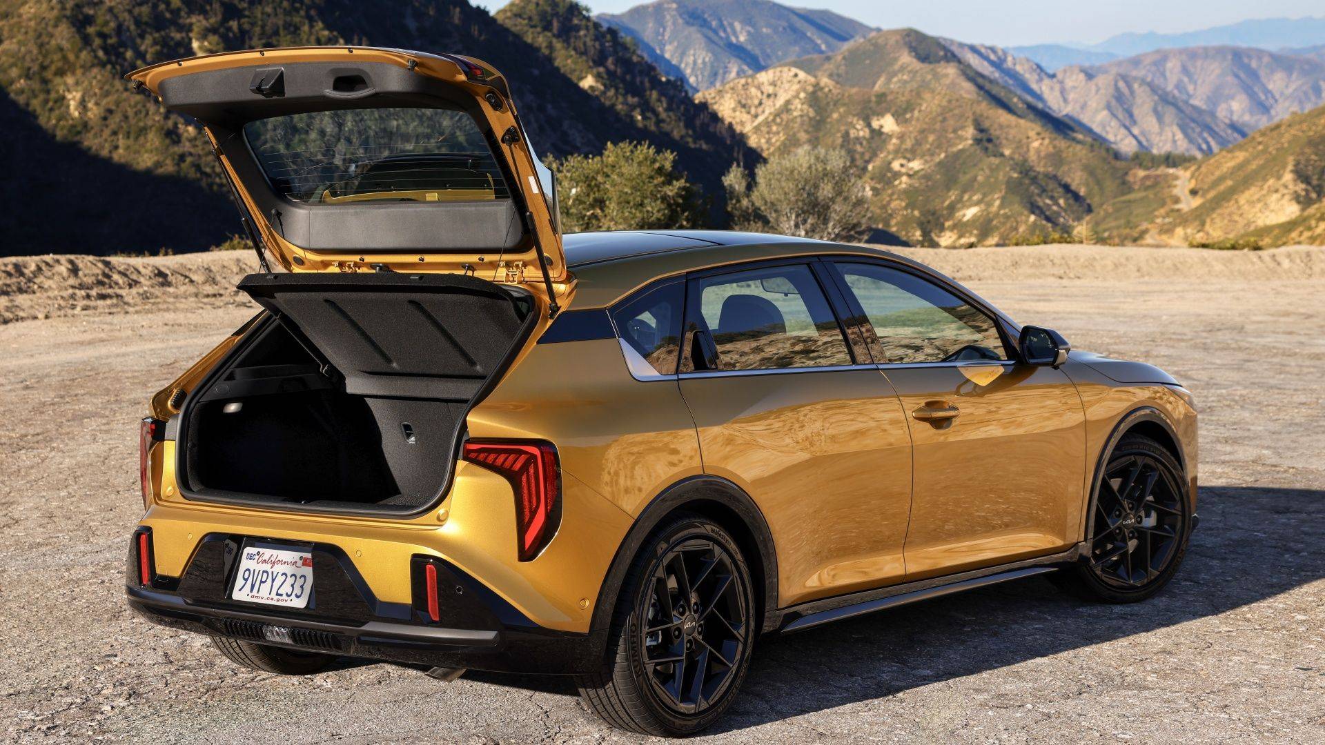 2026 Kia K4 Hatchback with open liftgate showing cargo access