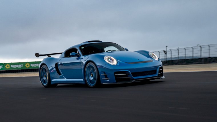 Blue RUF CTR3 Evo on a racetrack