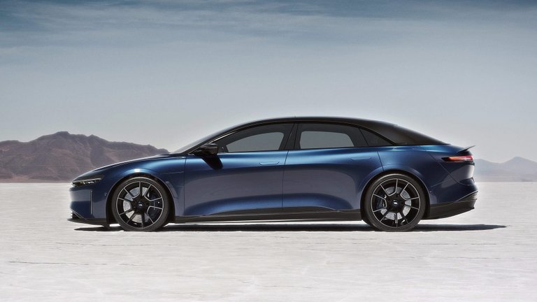 Blue Lucid Air Sapphire performance sedan on a dry lakebed