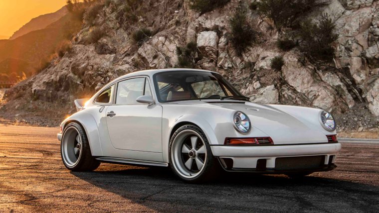 White Singer DLS on a road at sunset