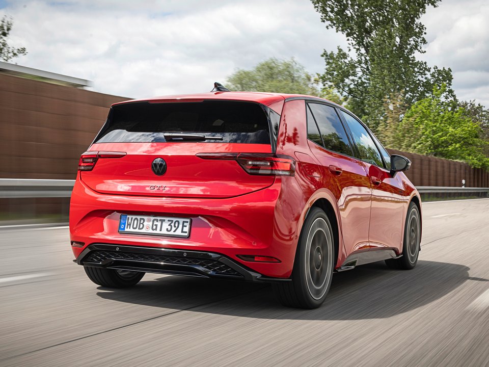 Rear three-quarter view of the red Volkswagen ID.3 GTI in motion