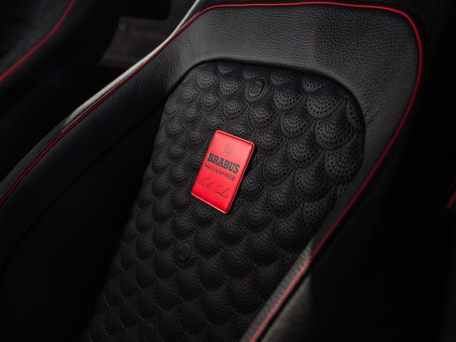 Perforated Brabus leather seat with red Masterpiece plaque and piping