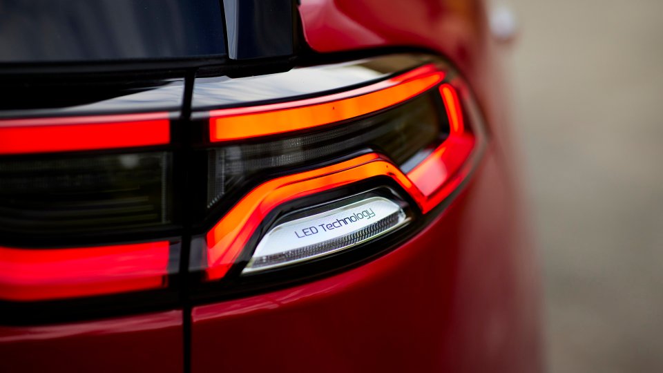 Illuminated rear LED light assembly on a red BYD Tang