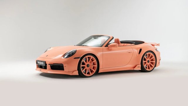 Peach-colored BRABUS 900 PEETCH Porsche 911 Turbo S Cabriolet in a studio