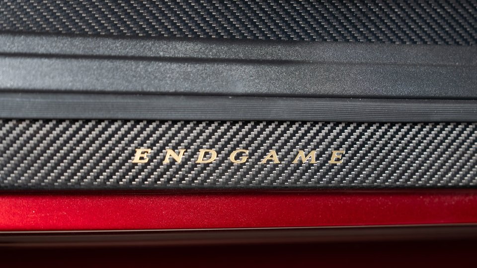 Project Endgame gold ENDGAME badging on carbon-fiber trim