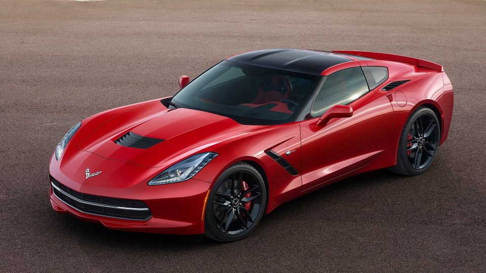 Red 2014 Chevrolet Corvette C7 Stingray viewed from the front three-quarter angle