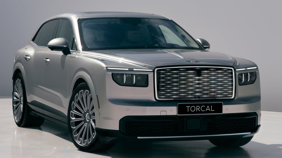 Front three-quarter view of the silver Bentley Torcal electric luxury SUV in a studio