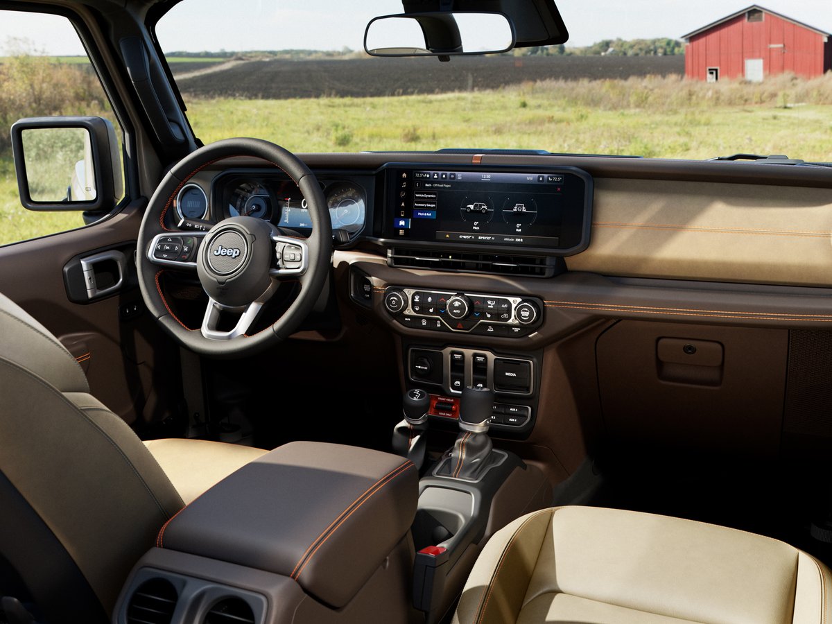 2027 Jeep Wrangler JL-2A cabin with dashboard display and tan interior trim