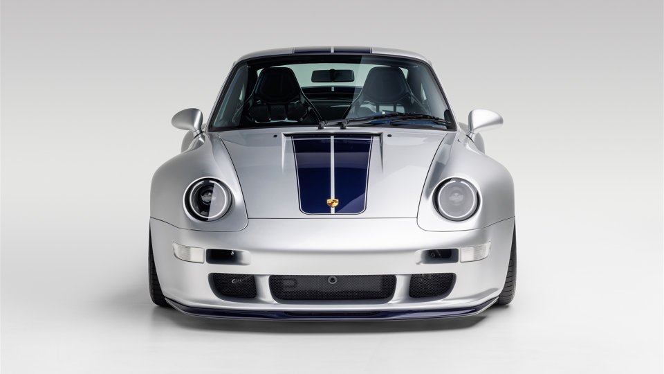 Silver Gunther Werks Porsche 911 coupe with dark blue hood stripes