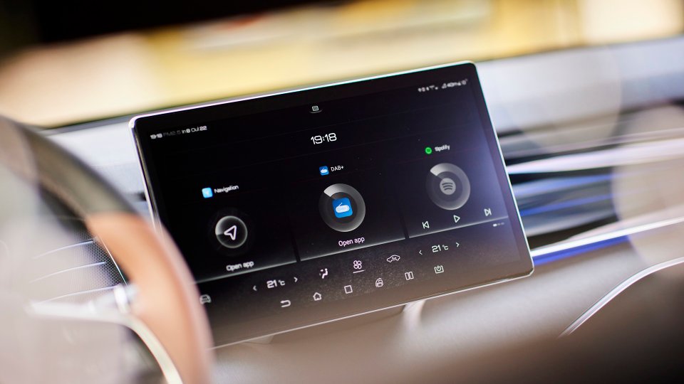 BYD infotainment display with navigation, audio, and climate controls