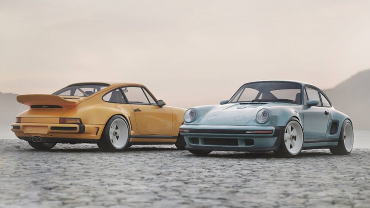 Yellow and blue Singer 911 Carrera Coupes on a mountain road