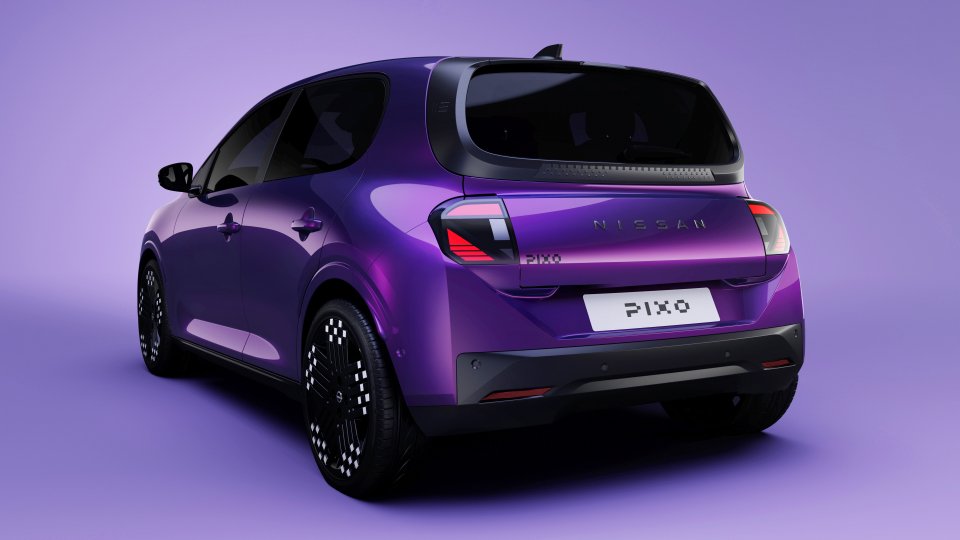 Rear three-quarter view of a purple Nissan Pixo electric city car