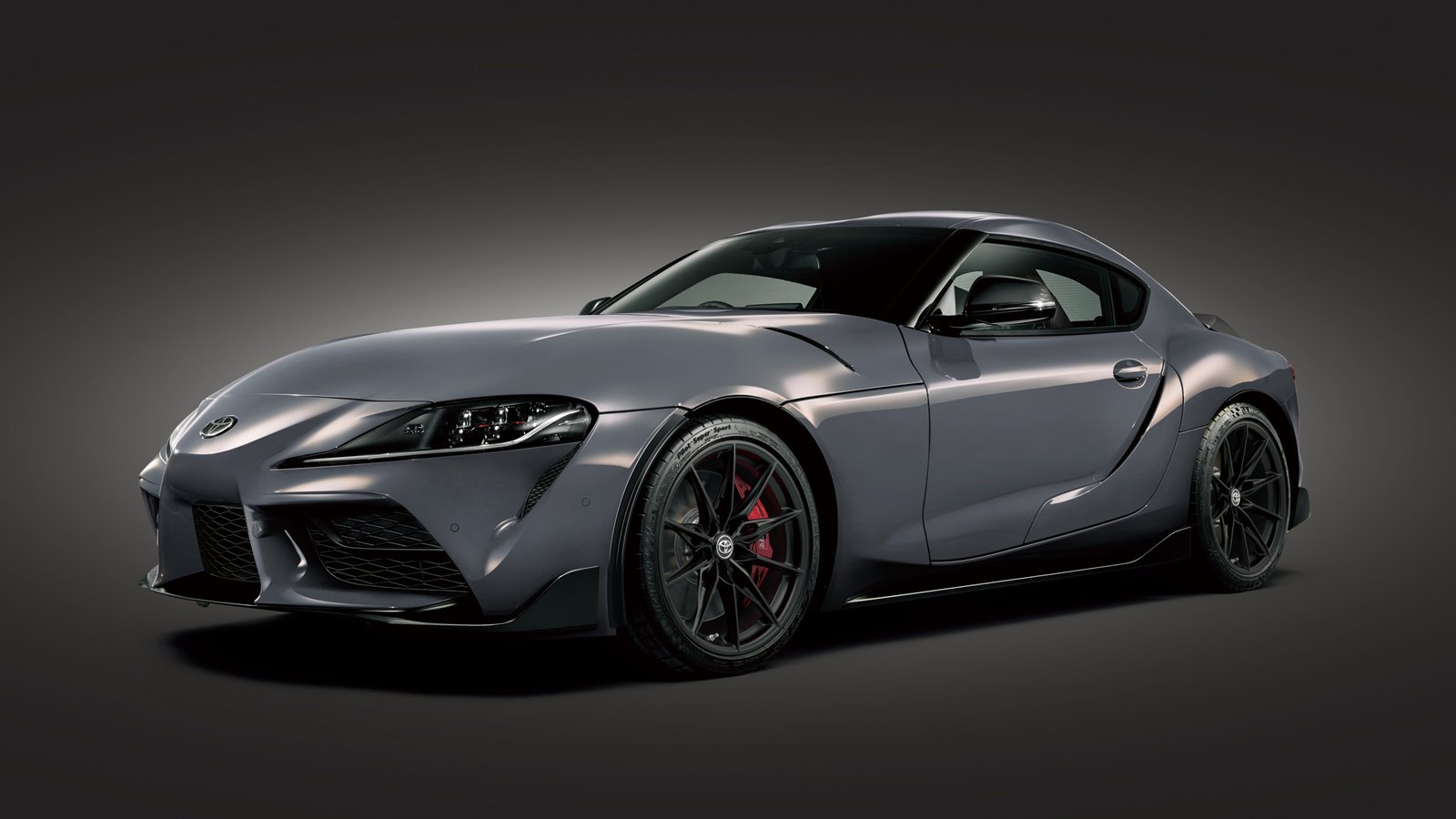 Gray Toyota GR Supra in a front three-quarter studio view