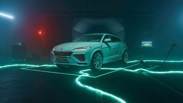 Mint green BRABUS 900 Mint based on a Lamborghini Urus in an illuminated studio