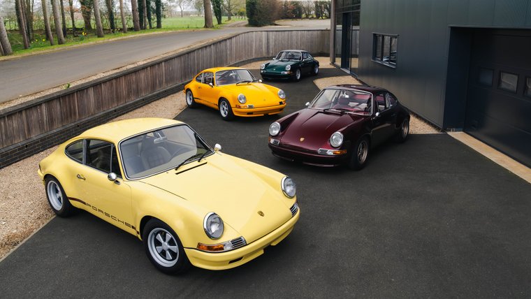 Tuthill Porsche 911K cars on a driveway