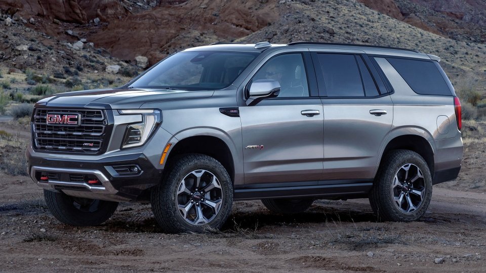 Silver GMC Yukon AT4 on a desert trail